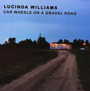 Car Wheels on a Gravel Road [Import]